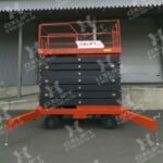 Фото 20 - Ножничный подъемник с электроподъемом и аккумулятором QX-050-140 DC/AC OXLIFT 500 кг 14 м.